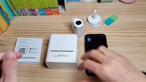 LeMinyun เครื่องพิมพ์ฉลาก L1S Pro มือถือแบบพกพาเครื่องพิมพ์ความร้อนขนาดเล็กเครื่องพิมพ์ฉลากเครื่องพิมพ์ป้ายชื่อบลูทูธ1ป้ายแบบม้วน