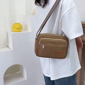 QNQN 【COD】กระเป๋าสะพายผ้าใบผู้ชาย กระเป๋าสะพายธุรกิจแฟชั่นกระเป๋าสะพายสะพายสำหรับผู้ชาย กระเป๋าสะพายแฟชั่นวินเทจแบบสบาย ๆ