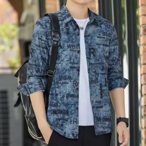 เสื้อเชิ้ตผู้ชายแขนยาวบางระบายอากาศได้ดีผ้าไหมน้ำแข็งฤดูร้อน 2025 ดีไซน์ไม่สมมาตร ดีไซน์ Graffiti ทรงหลวม ทรงปกติ