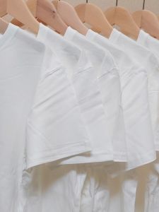 เสื้อยืดคอกลมแขนสั้นผ้าฝ้ายแท้หลวมสำหรับผู้ชายและผู้หญิง สไตล์สตรีท ฤดูร้อน ทรงพอดีตัว เสื้อเชิ้ตทรงพื้นฐาน