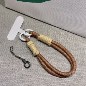 สร้อยข้อมือโทรศัพท์มือถือแบบสั้นแฟชั่นสำหรับผู้หญิง สายรัดข้อมือป้องกันการตกหล่นและลื่น สร้อยคอโทรศัพท์มือถือแบบยูนิเซ็กซ์