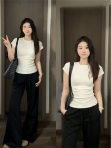 Áo Thun Tay Ngắn Màu Trắng Cổ Tròn Cỡ Lớn Cho Nữ Mùa Xuân Hè Phong Cách Mới Dáng Ôm Vừa Vặn Chất Liệu Cotton Mặc Trong