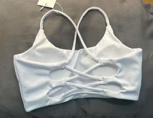 Áo bra đan dây tập gymyogaaerobicjumpsuit có mút