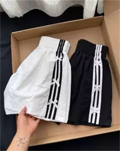กางเกงขาสั้นลายทางผูกโบว์สีดำสำหรับผู้หญิง กางเกงขายาวทรงเอลำลองสำหรับใส่ไปทำงานในฤดูร้อน กางเกงขายาวทรงเอเอวสูง กางเกงขายาวทรงเอ