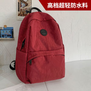 กระเป๋าเป้สะพายหลังผ้าไนลอนน้ำหนักเบาสำหรับผู้หญิง กระเป๋าเดินทางแบบลำลอง ป้องกันน้ำ เวอร์ชั่นใหม่สีแดงม่วง กระเป๋าใส่ของสำหรับใส่หนังสือ