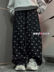 กางเกงกีฬาผู้หญิง กางเกงขายาวทรงหลวมพิมพ์ลายดอกไม้ กระดุมโบว์สีดำ กางเกงขายาวลำลองฤดูใบไม้ผลิ ฤดูใบไม้ร่วง ฤดูหนาว สไตล์อเมริกัน