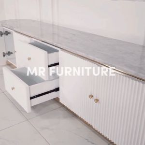 Meja TV Marmer Oval Duco Putih Salur Kombinasi Gold Stainless