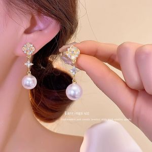 Rhinestone big pearl earrings long light luxury earrings for women 2025 new niche design earrings