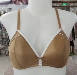 KIT AVON Brown bra with white trim and bow detail.soft cup material