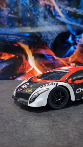 Mainan Mobil Remot Kontrol RC Sedan Balap Electric Speed Transparent Car Batre Cas 1/18