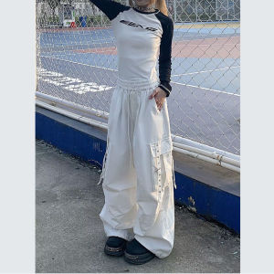 กางเกงขายาวทรงหลวมสไตล์ฮิปฮอปสีขาวสำหรับผู้หญิง ฤดูใบไม้ผลิและฤดูใบไม้ร่วง ดีไซน์กระเป๋าหลายช่อง กางเกงขายาวทรงหลวม ผ้าโพลีเอสเตอร์