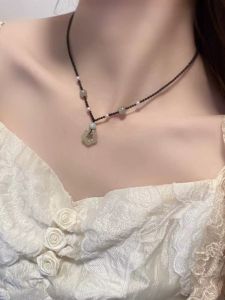 Elegant New Chinese Style Jade Flower Necklace for Women Luxury Minimalist High-End Feeling Woven Rope Sweater Clasp Spring Summer Pendant