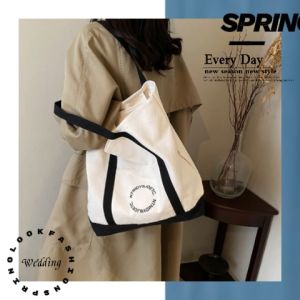 QZshop สินค้าใหม่ กระเป๋าผ้าสะพายไหล่ งานดีเทลแฟชั่นเกาหลีใบใหญ่ใส่ของได้เยอะมากๆมีช่องการใช้งานด้านหน้าให้ด้วยน๊าราคาโคตรดี ไม่มีพลาดมาก