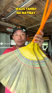 Luckylkh Yellow-handled broom with natural bristles for sweeping debris on tiled floor.