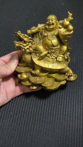 Tượng Phật Di lặc cưỡi Long quy phong thuỷ chất liệu bằng đồng vàng MS300