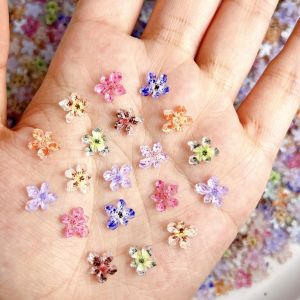 50PCS Creative ไม่สม่ําเสมอดอกไม้สีเล็บ Charms 3D โปร่งแสงที่ไม่ซ้ํากันจุดดอกไม้เรซิ่นตกแต่งเล็บ DIY เล็บ