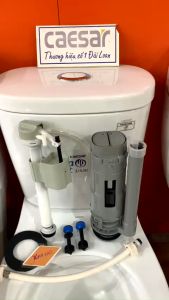 [HCM]Xả bàn cầu Caesar 2 nhấn chính hãng KAG-XBC25 bộ ruột két nước xí bệt cao cấp 2 khối C1330-C1340 xả êm siêu bền hiệu suất sử dụng tốt