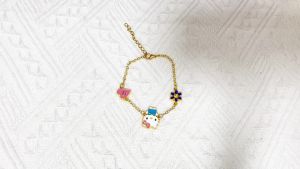 Sanrio | Gold Tone Hello Kitty Charm Bracelet Zinc Alloy with Purple Flower & Pink Heart Charms Adjustable Link Chain for Girls