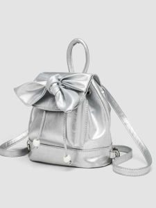 กระเป๋าเป้สะพายหลังผู้หญิงขนาดเล็กแบบลำลองสำหรับเดินทางพร้อมโบว์ผีเสื้อ กระเป๋าใส่หนังสือสำหรับนักเรียน กระเป๋าเป้สะพายหลัง PU ลายสีพื้น