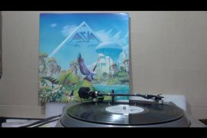 1 แผ่นเสียง 12นิ้ว i77 ASIA -ALFHA แผ่นVG++/NM ริ้วรอยบาง เสียงรบกวนน้อยนิดไม่มีรอยลึก แผ่นล้างทำความสะอาดแล้ว ปกVG++ มีตำหนิขอบนิดหน่อย ขอบไม่ขาด สันไม่ทะลุ