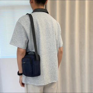 MENSPE กระเป๋าสะพายมินิกระเป๋าเดินทางของผู้ชายกระเป๋าเดินทางธุรกิจความจุขนาดใหญ่กระเป๋าโทรศัพท์น้ำหนักเบาสบาย ๆ กระเป๋าเดินทางแฟชั่นกีฬาถนนกระเป๋าสำหรับนักศึกษาวิทยาลัย