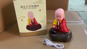 Tượng chú tiểu đầu gật gù gõ mõ tụng nhạc kinh phật giáo tiếng Phạn pin sạc USB có đèn nhấp nháy trang trí nhà và xe ô tô hoạt động thời gian lâu Hàng Trang Trí Phong Thủy Quảng Châu - Lazada
