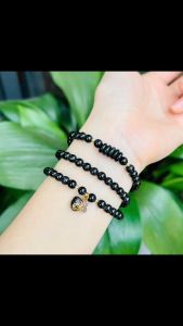 vòng tay dáng chuỗi thạch anh tóc đen tự nhiên mix đồng điếu tóc đen và charm túi tiền thạch anh tóc đen bọc vàng tây vòng tay đá phong thủy hợp mệnh mộc mệnh thủy trang sức thiết kế đủ hóa đơn thẻ bảo hành