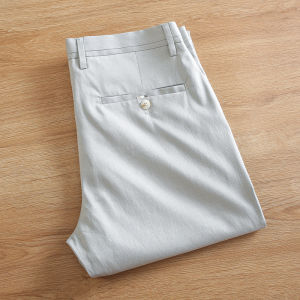 กางเกงลำลองชายผ้าลินินบางระบายอากาศได้ดี กางเกงขายาวทรงตรงสบายๆ สีกรมท่า กางเกงขายาวสำหรับใส่ไปทำงานในช่วงฤดูร้อน