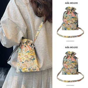 กระเป๋าสะพายข้างผ้าใบพิมพ์ดอกไม้สำหรับเดินทางในฤดูใบไม้ร่วงและฤดูหนาว กระเป๋าใส่โทรศัพท์มือถือสำหรับผู้หญิง กระเป๋าสะพายข้างแบบลำลองสำหรับวัยรุ่น ปิดด้วยเชือกผูก