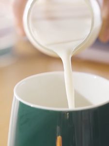 Bộ quà tặng ly sứ Lucky cao cấp kèm đế giữ nhiệt điện tử 40–60°C – sang trọng – tiện lợi