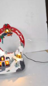 D&D Home l FC509 Lumineo Christmas Village Scenery with Lights and Motion Festive Decoration