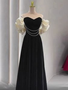 French Hepburn Style Evening Dress for Women Classy Light Luxury Minority Banquet Host Catwalk Black off-Shoulder Dress