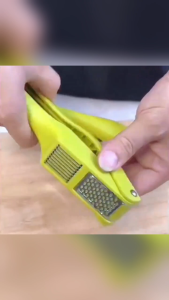 2 In 1 Garlic Slicer And Mincer Multipurpose Garlic Press And Slicer Stainless Steel And Durable Plastic Convenient Size Easy To Use And Clean Good For Home & Commercial Use