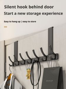 Bedroom door cloak hooks behind storage racks