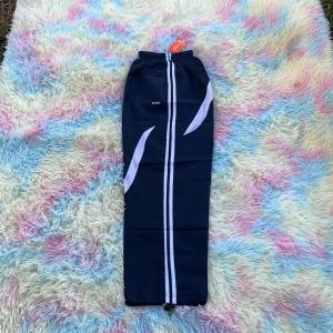 888#กางเกงผ้าร่มแต่งแถบสีสดใสมีซับในเป็นตะข่ายขาวกางเกงขายาวผ้าร่มเนื้อดี แถบสีสดใส