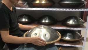 [ammoon]Mini Handpan Hand Drum in C Tone 9 Notes 16 Inches Percussion Instrument with Drumstick Handpan Stand