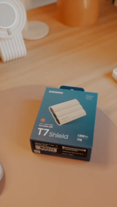 Samsung Portable SSD T7 Shield USB 3.2 1TB (Beige) Solid State Drive Flash Memory Storage Device Durable Stylish Rugged Durability IP65 Dust and Water Resistance 1000 MB/s Compatible with Desktop PC Laptop Windows Mac Android Gaming Consoles /MU-PE1T0K/WW