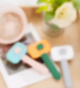 หวีแปรงขนสัตว์ หวีแปรงขนแมว หวีแปรงขนหมา มีปุ่มดันขนออก หวีขนแมว แปรงขนสุนัข ที่แปรงขนสุนัข แมว แปรงขนแมว พกพาสะดวก น้ำหนักเบา