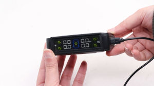 TPMS Universal Tire Pressure Alarm Monitoring System Car Tire Pressure Monitoring System Solar Panel USB Charging Smart Car with 4 External Sensors Real-time LCD Display