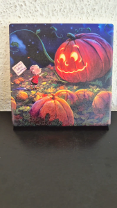 Halloween coaster (Linus holding a sign that says Welcome Great Pumpkin)