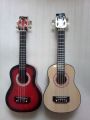 ukulele asli  senar 4 bonus pick murah. 