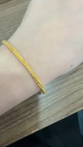 Poh Heng Jewellery 24K Twisted Bangle in Yellow Gold [Price By Weight]
