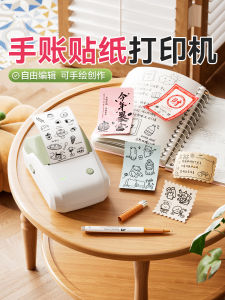 พิมพ์เครื่องพิมพ์รูปแบบพิมพ์ร้อนแบบพกพา ป้ายสติ๊กเกอร์ ชื่อ บันทึก ขนาดเล็ก สำหรับใช้ในบ้าน พร้อม Bluetooth ที่เชื่อมต่อกับโทรศัพท์