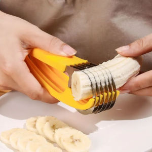 ผลไม้สแตนเลสหั่นไส้กรอกสร้างสรรค์ Pengiris Pisang YESPERY ที่สไลด์ผักแตงกวาถ้วยและช้อนตวงอุปกรณ์ที่ใช้ในครัว