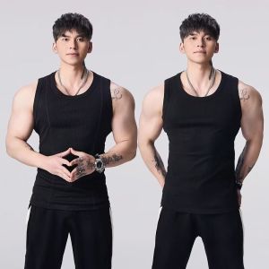 อินเทรนด์ แขนกุด ขนาดใหญ่ เสื้อกั๊ก การแสดงกล้ามเนื้อชั้นฐานการฝึกออกกําลังกายของผู้ชาย ฤดูร้อน ชุดกีฬาคอกลม Sweatback ลำลอง สไตล์อเมริกัน