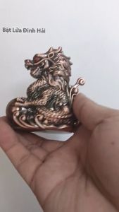 Rồng ôm long châu bật lửa khè xài ga ic chất liệu đồng mẫu để bàn phong thủy