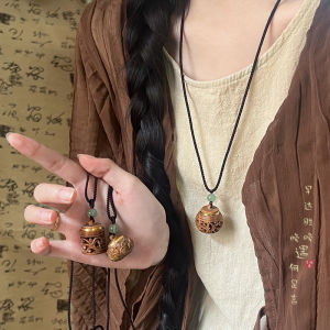 Krelain Vintage Openable Sandalwood Hollow Woven Necklace: A Stylish Women's Accessory