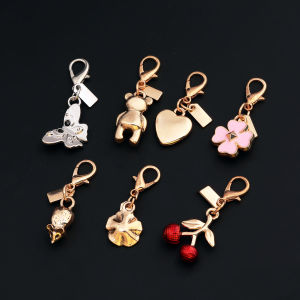 Creative Gold Bear Red Cherry Clover Butterfly Bag Pendant Women Phone Keychain Fashion Car Bag Charm Jewelry Mothers Day Gifts