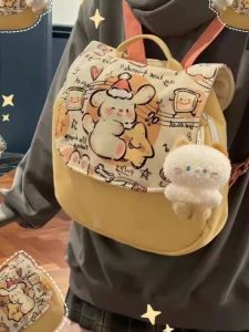 กระเป๋าเป้สะพายหลังผ้าใบลายสุนัขสีเหลืองน่ารักสำหรับผู้หญิง กระเป๋าสะพายไหล่แบบลำลองสำหรับเดินทางและไปโรงเรียน กระเป๋าใส่หนังสือแบบนิ่ม