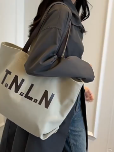 SEA YADOU  กระเป๋าพร็อพกระเป๋าผ้าใบลำลองสำหรับนักเรียนรุ่นใหม่กระเป๋าโท้ทหญิงกระเป๋าสะพายใบใหญ่แมทช์ลุคง่ายความจุมาก